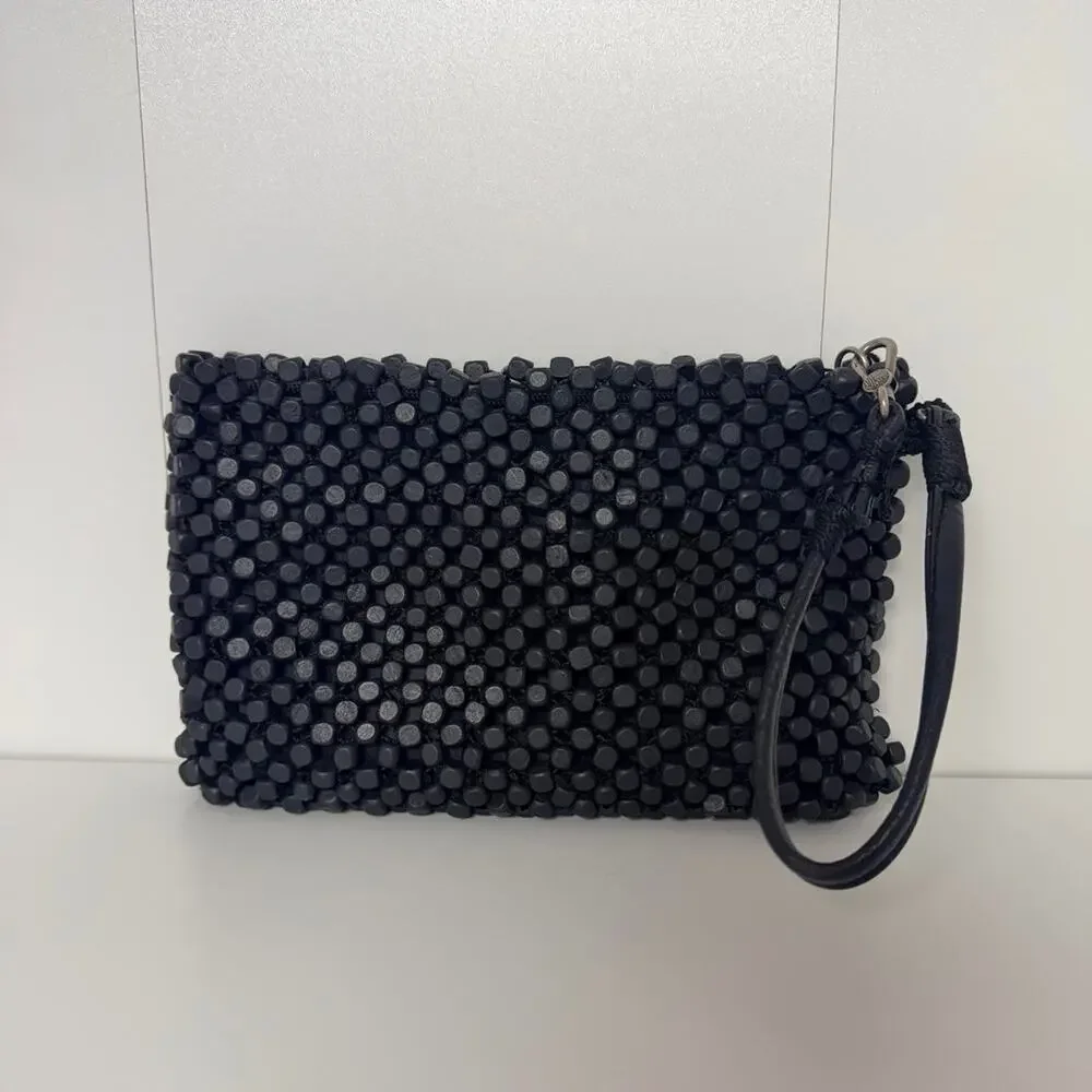 The sak black wood beaded clutch